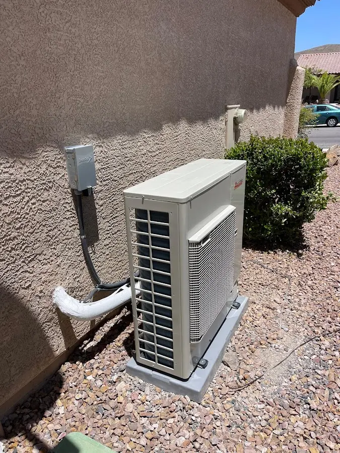 Residential air conditioning condenser unit in Ives Estates
